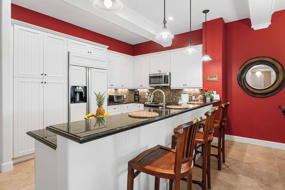 Kitchen Breakfast Bar with Seating for Three, Refrigerator, and Microwave