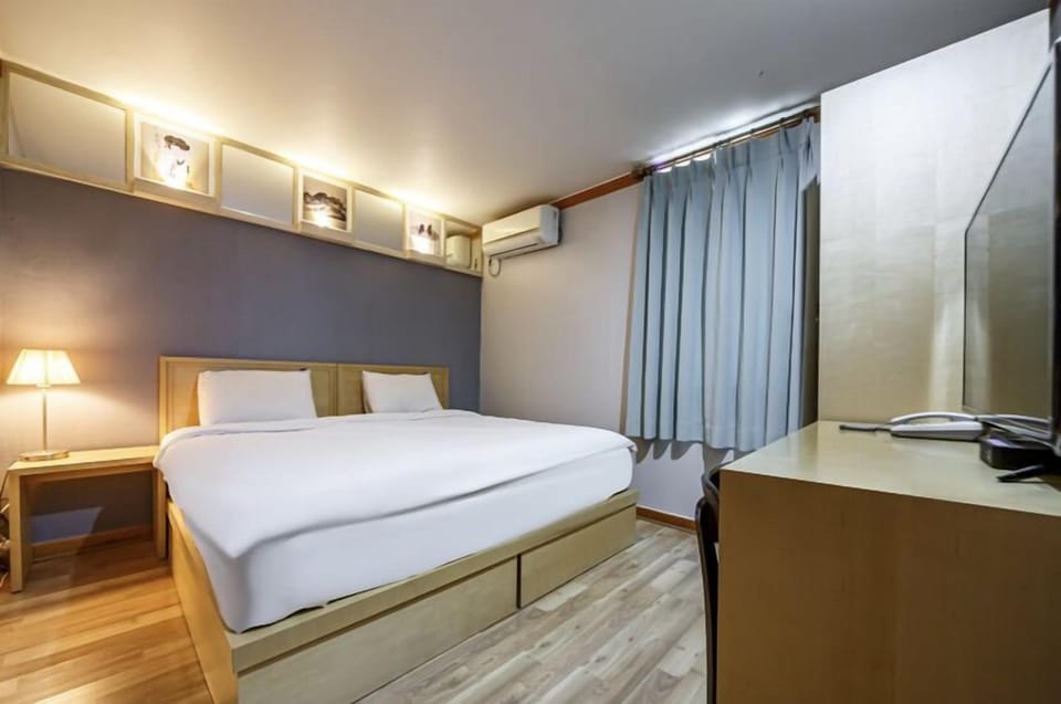 Double Room (Extra futon set charge 10,000 on site) | Desk, blackout drapes, free WiFi, bed sheets