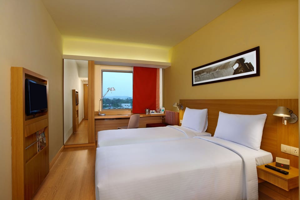 Premium bedding, down comforters, memory foam beds, minibar