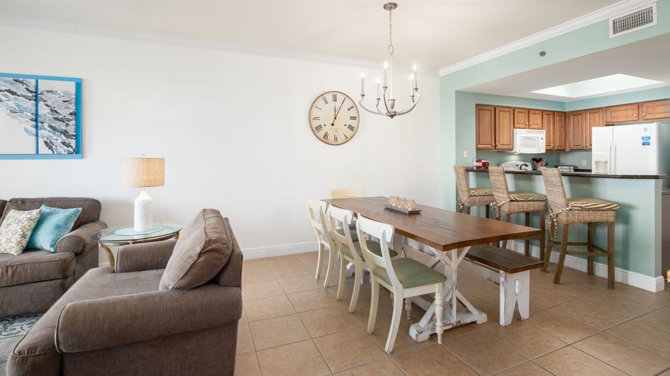 The dining table for eight people plus breakfast bar with extra seating.