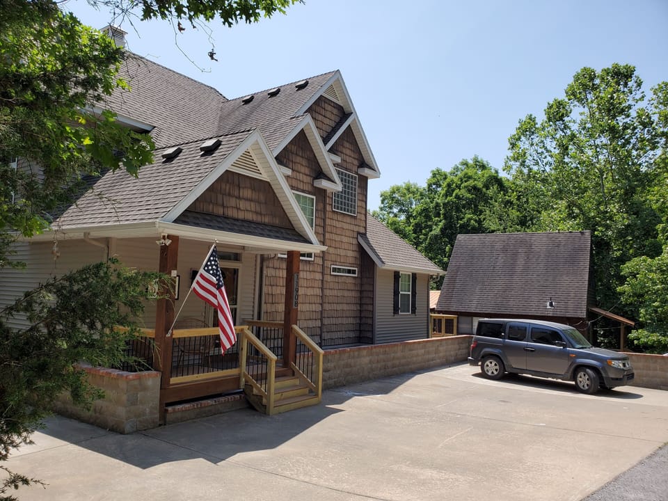 Front Side of House.  Enough parking for 5 cars.  Extra room for parking at the 