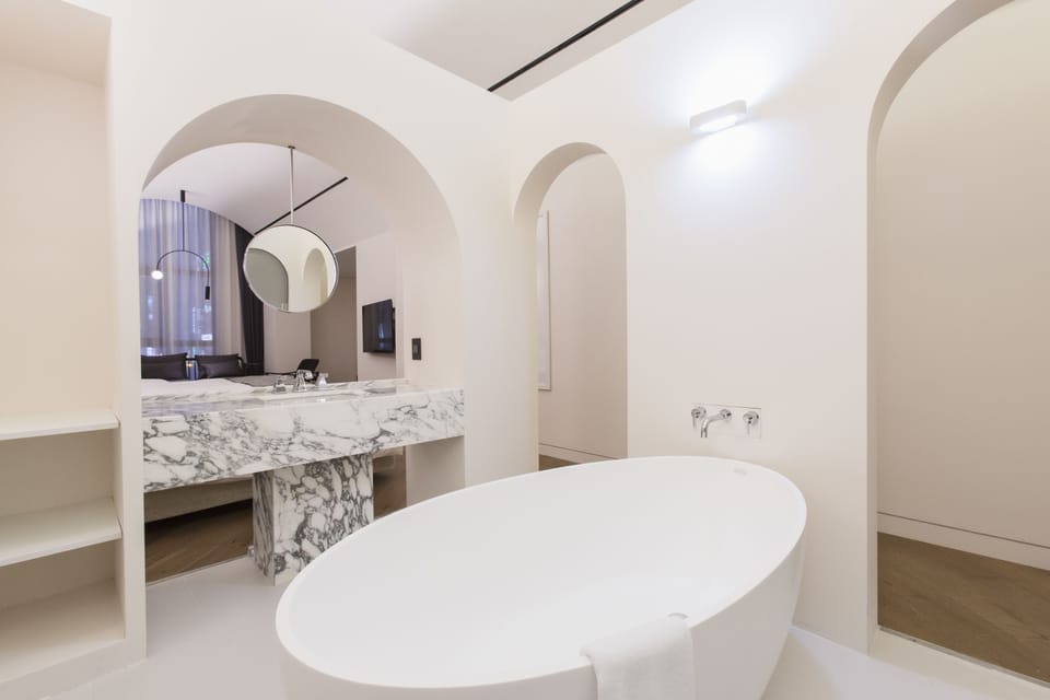 Family Triple Room | Bathroom | Combined shower/tub, slippers, towels