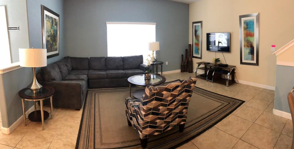 Townhome, 5 Bedrooms | Living area | 60-inch Smart TV with cable channels, TV, Netflix