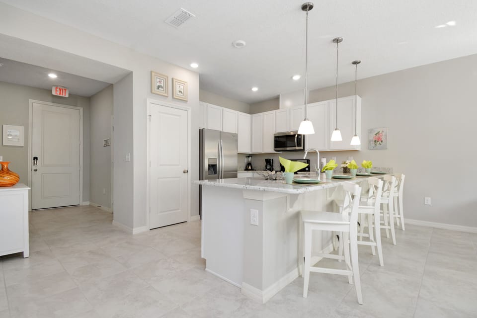 Townhome, 4 Bedrooms | Private kitchen | Full-size fridge, microwave, oven, stovetop