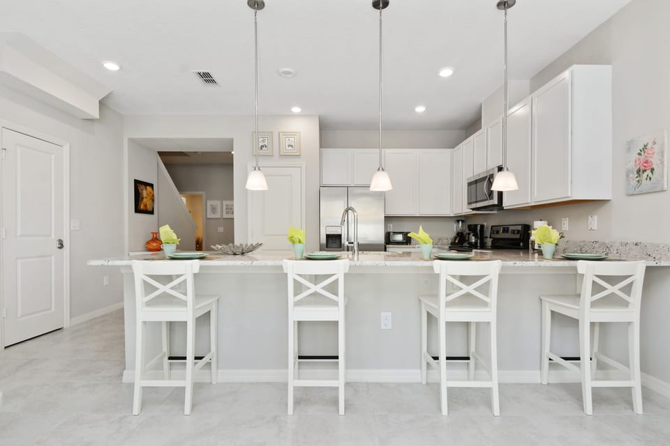 Townhome, 4 Bedrooms | Private kitchen | Full-size fridge, microwave, oven, stovetop
