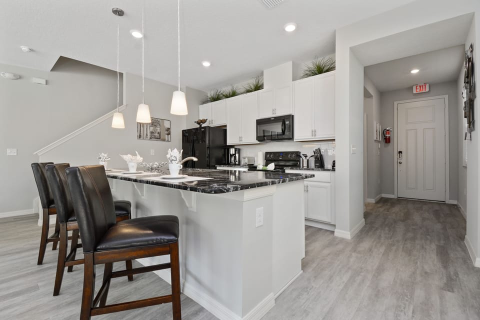 Townhome, 4 Bedrooms | Private kitchenette | Full-size fridge, microwave, oven, stovetop