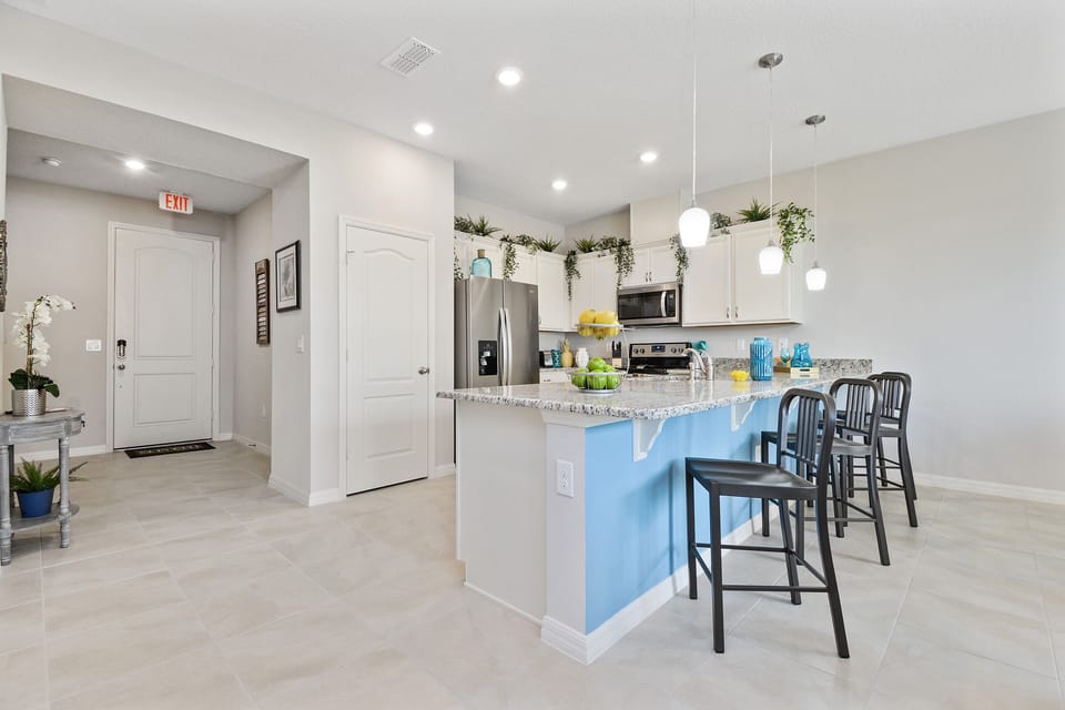 Townhome, 4 Bedrooms | Private kitchen | Full-size fridge, microwave, oven, stovetop