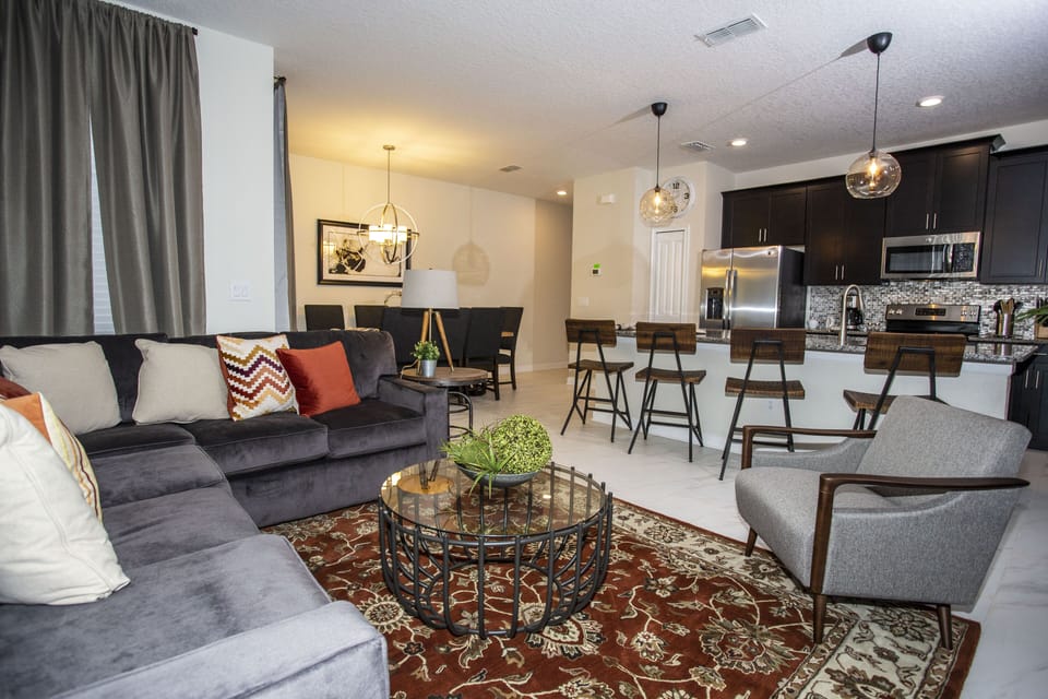 Townhome, 4 Bedrooms | Living area | 60-inch flat-screen TV with cable channels, Smart TV, Netflix