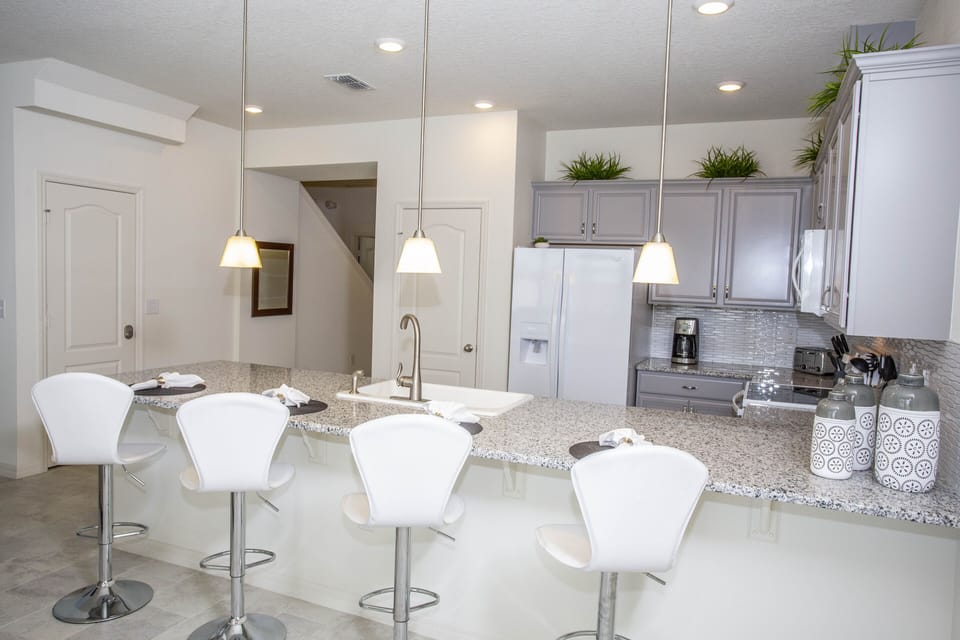 Townhome, 4 Bedrooms | Private kitchenette | Full-size fridge, microwave, oven, stovetop