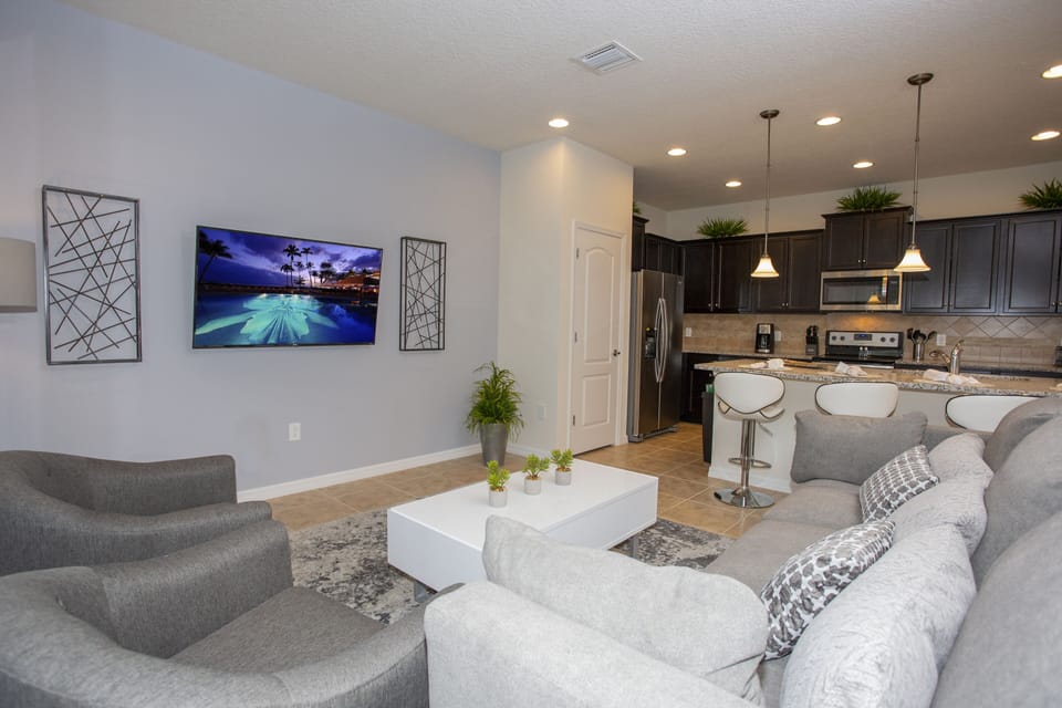 Townhome, 5 Bedrooms | Living room | 60-inch Smart TV with cable channels, TV, Netflix