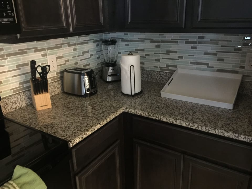 Townhome, 4 Bedrooms | Private kitchen | Full-size fridge, microwave, oven, stovetop
