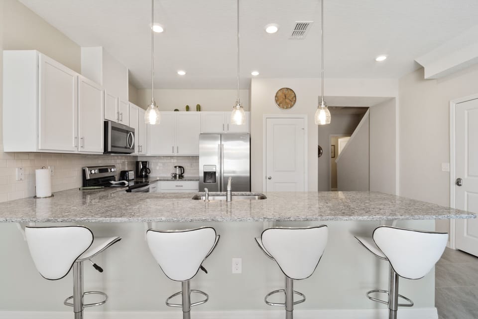 Townhome, 4 Bedrooms | Private kitchenette | Full-size fridge, microwave, oven, stovetop