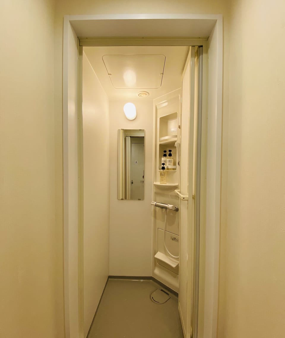 Standard Shared Dormitory, Mixed Dorm | Bathroom | Shower, slippers, towels