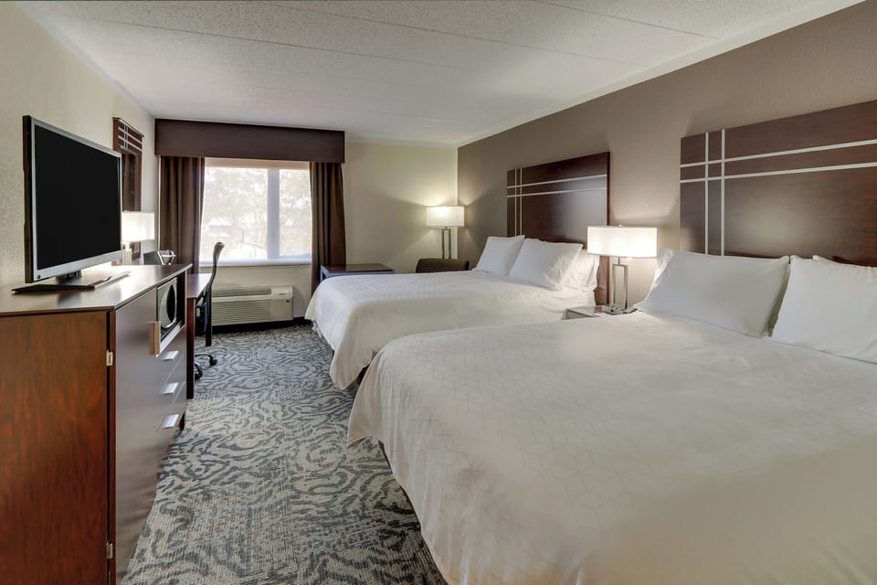 Premium bedding, desk, blackout drapes, iron/ironing board