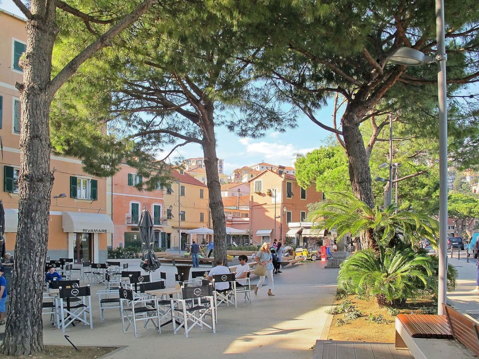 Building, Plant, Sky, Window, Tree, Infrastructure, Table, Road Surface, Shade, Urban Design