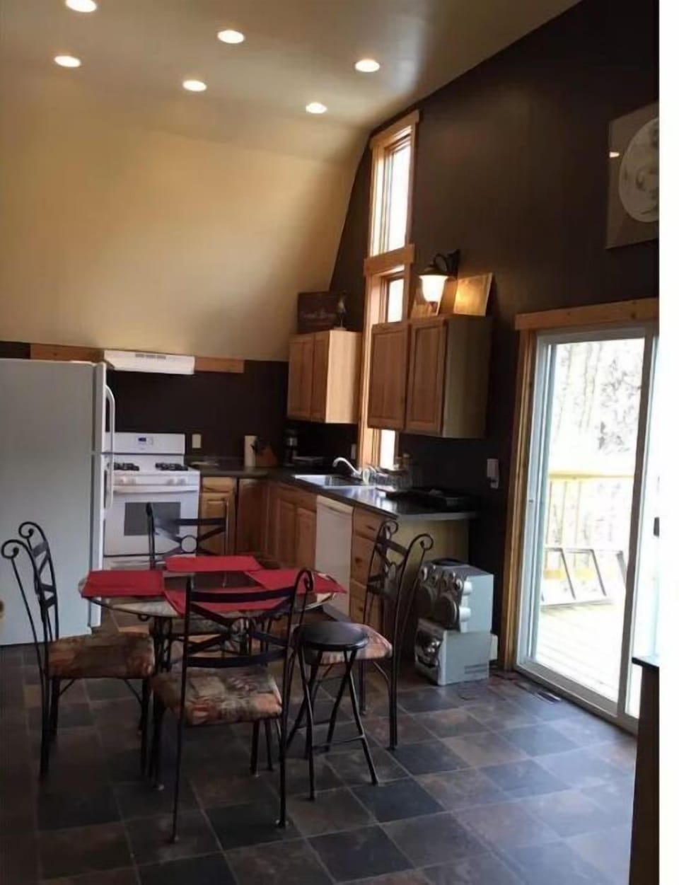 Looking into kitchen with outside deck.