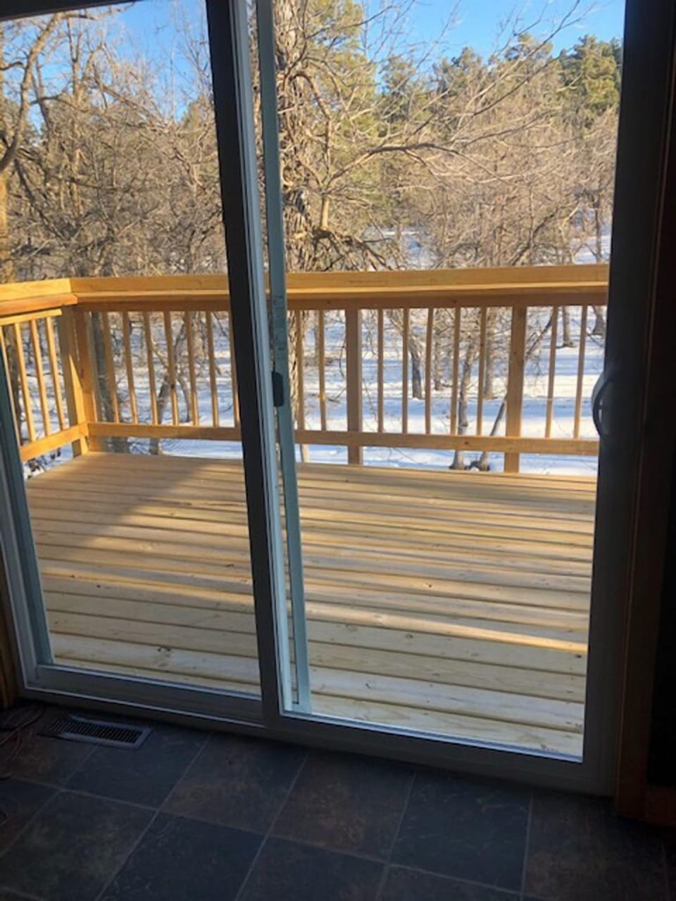 Outside deck off 2nd floor main area.  Very high off ground.