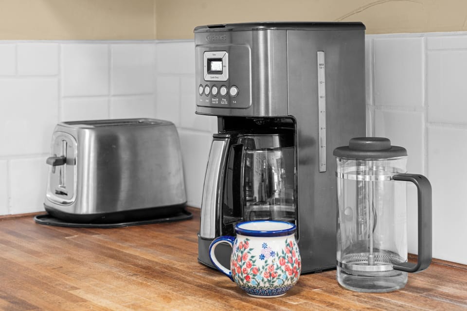 Coffee maker, French press, and a toaster are available for your use.