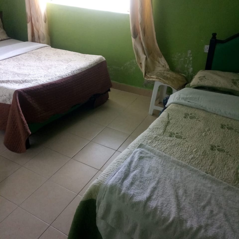 Double Room | Desk, blackout drapes, bed sheets