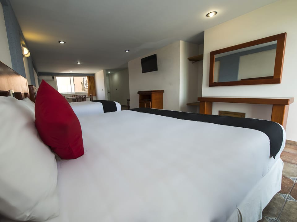 Deluxe Quadruple Room | Free WiFi, bed sheets