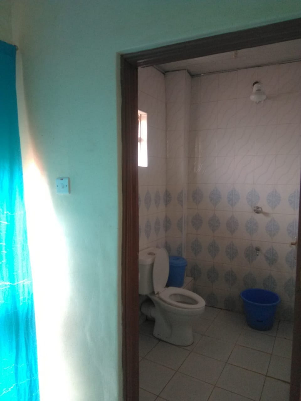 Shower, rainfall showerhead, slippers, towels