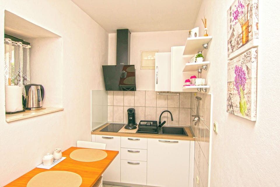 Apartment (A1) | Private kitchen | Fridge, stovetop, espresso maker, electric kettle