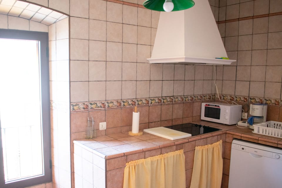 Highchair, cleaning supplies, paper towels