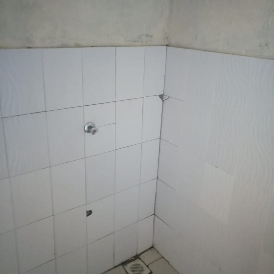 Standard Room | Bathroom | Shower, towels, soap, toilet paper