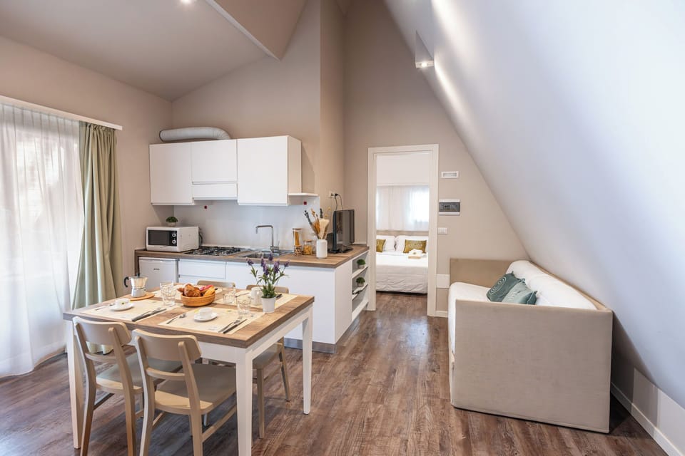Chalet Deluxe | Living area | 20-inch LCD TV with satellite channels, TV, table tennis