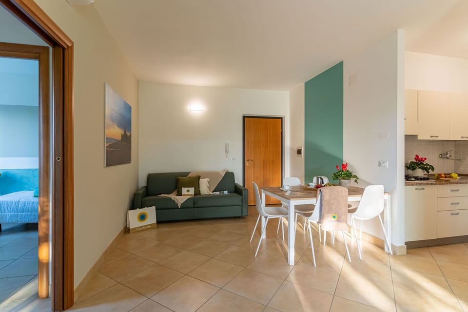 Comfort Condo | Living area | 15-inch flat-screen TV with cable channels, TV, table tennis