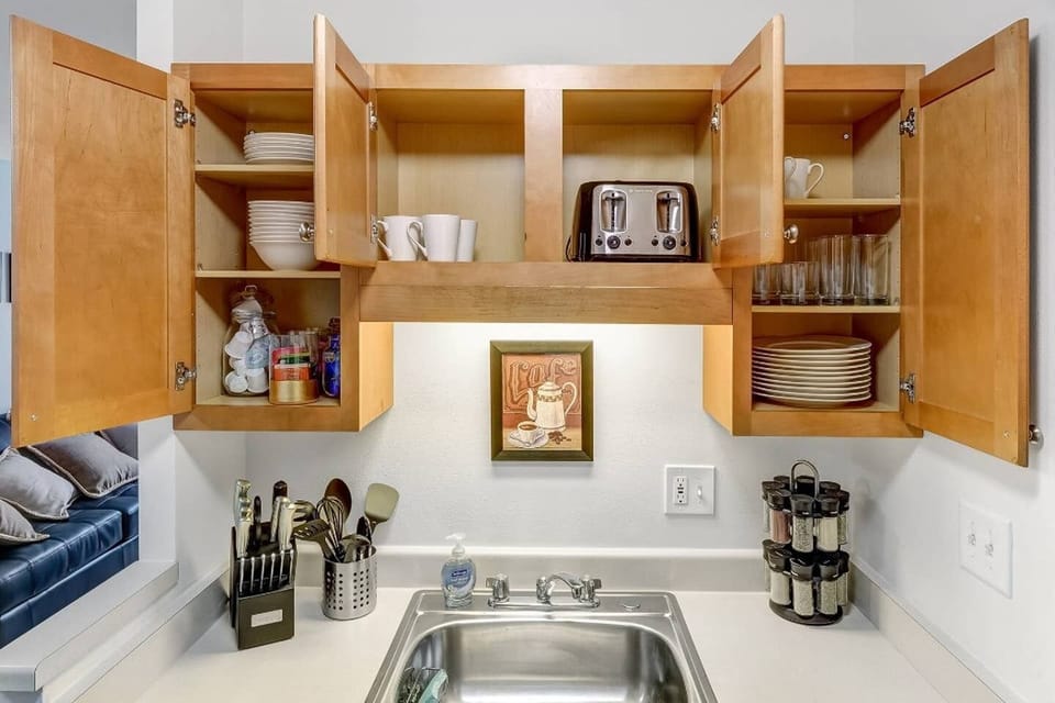 Our kitchen has everything you need for feasting on carry out or cooking a gourmet meal.