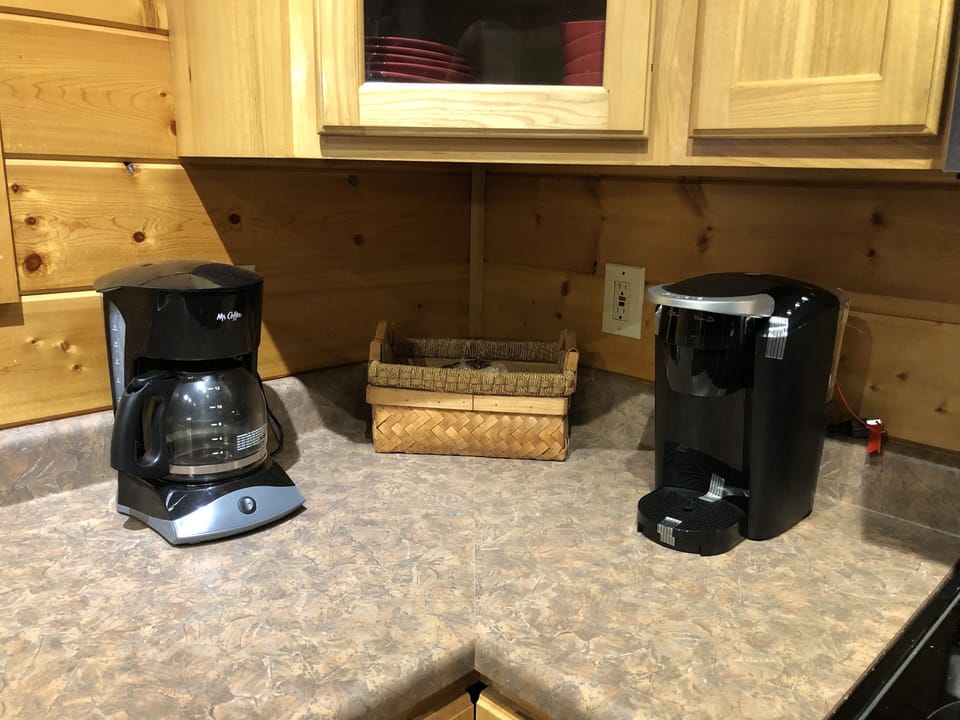 Coffee maker, Keurig machine and a fully stocked kitchen.