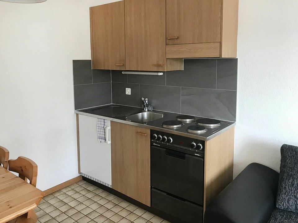 Brown, Cabinetry, Kitchen Sink, Sink, Tap, Countertop, Property, Furniture, Building, Kitchen Stove