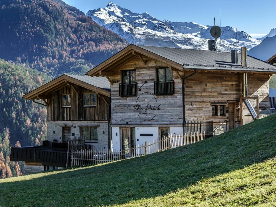 Building, Mountain, Property, Window, Sky, Ecoregion, Plant, Natural Landscape, House, Wood