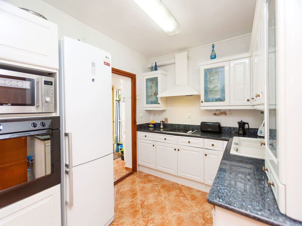 Property, Room, Kitchen, Furniture, Countertop, Building, Cabinetry, Real Estate, House, Floor