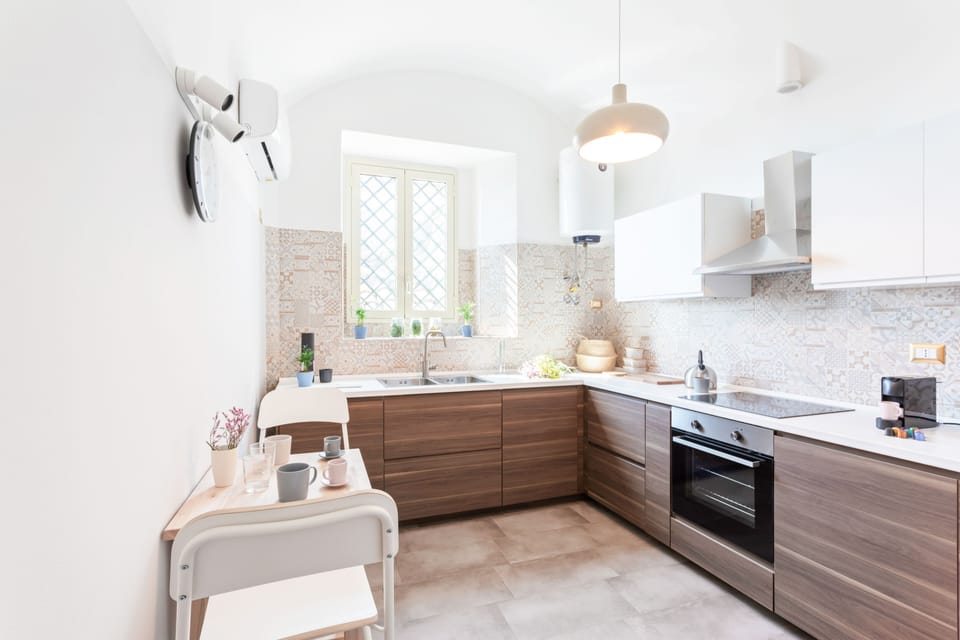 Apartment, 1 Bedroom | Private kitchen | Full-size fridge, oven, stovetop, dishwasher