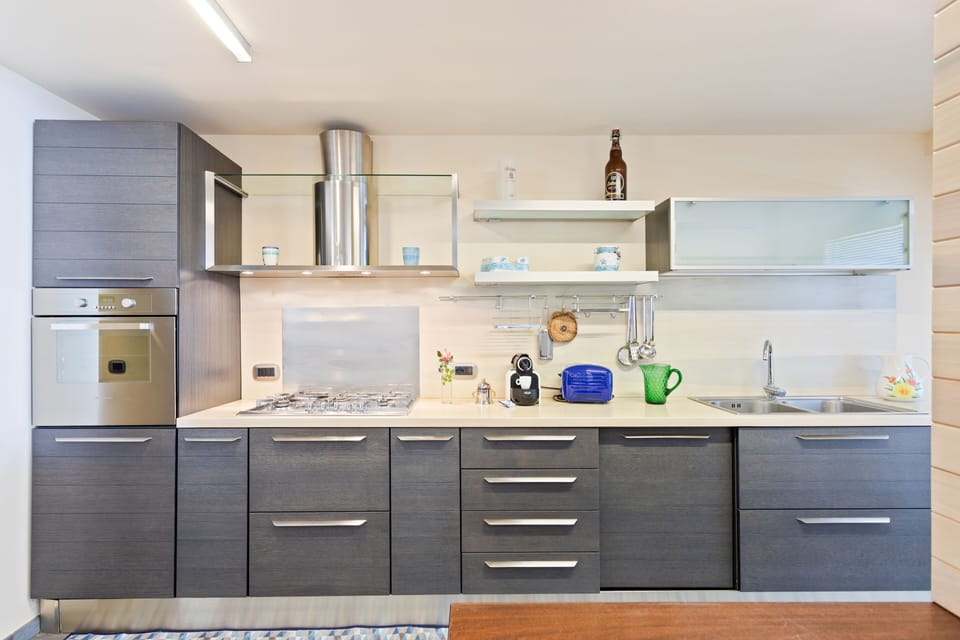 Apartment, 3 Bedrooms | Private kitchen | Full-size fridge, oven, stovetop, dishwasher