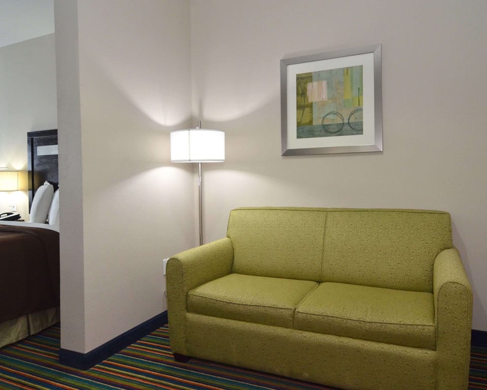 Suite, 1 King Bed with Sofa bed, Non Smoking | Iron/ironing board, free cribs/infant beds, rollaway beds, free WiFi