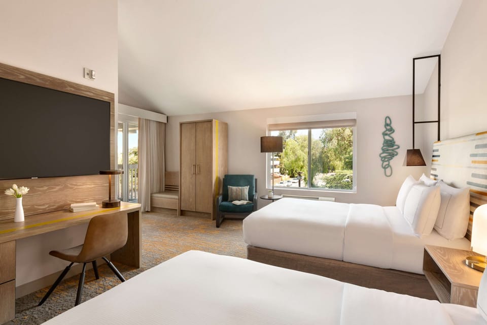 Premium bedding, down comforters, in-room safe, blackout drapes