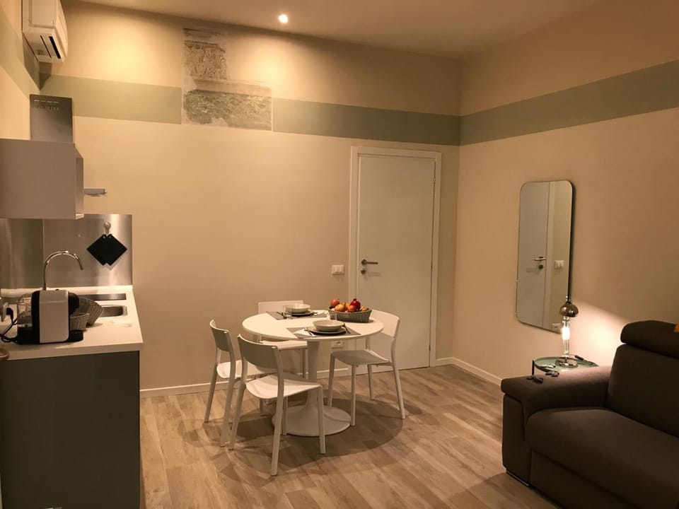Deluxe Apartment | Living room | Flat-screen TV