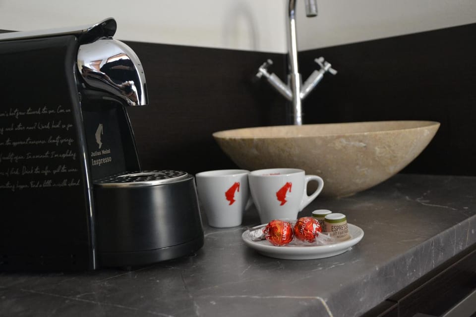 Business Triple Room, City View | In-room dining