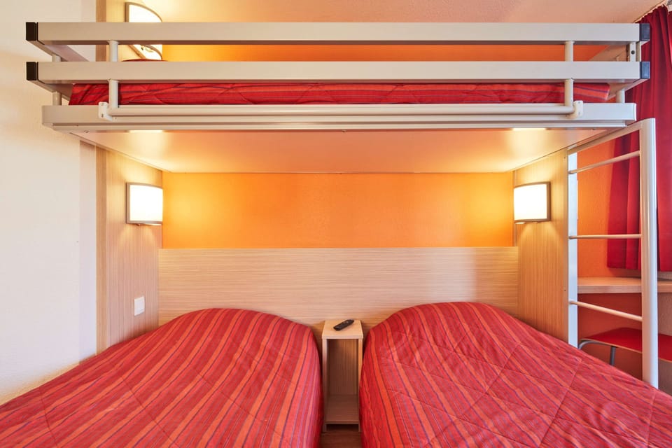 Desk, free WiFi, bed sheets