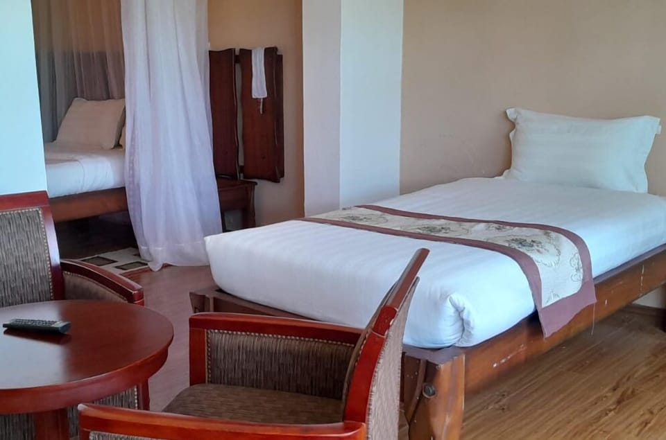 Double Room | Desk, iron/ironing board, free WiFi, bed sheets