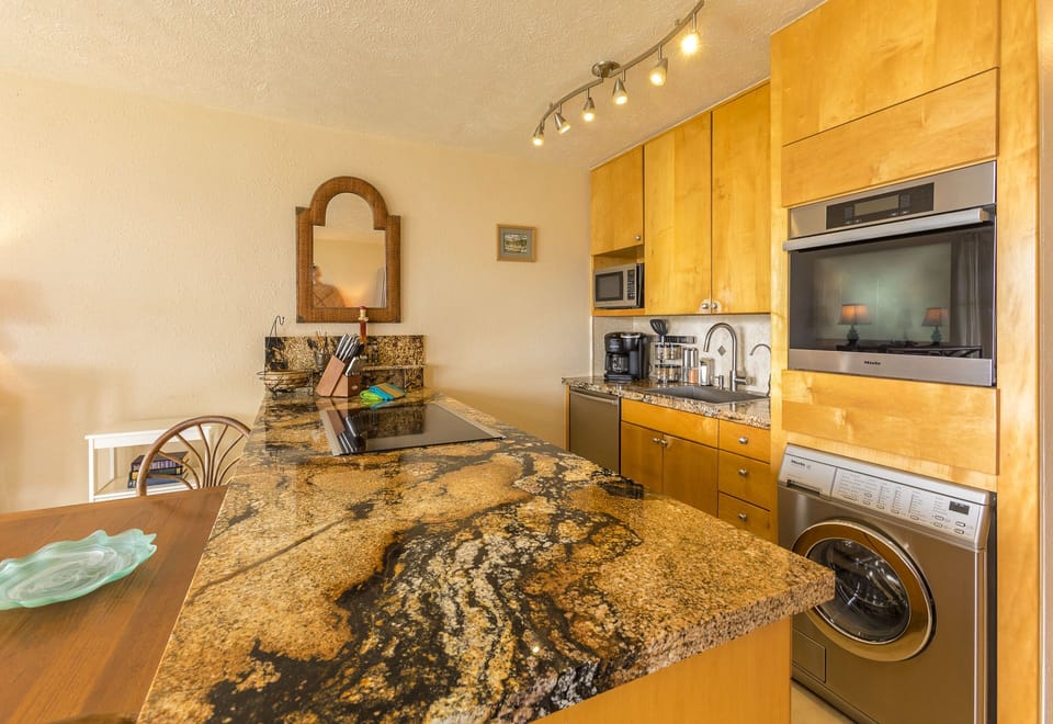Remodeled kitchen features brand new Maile appliances