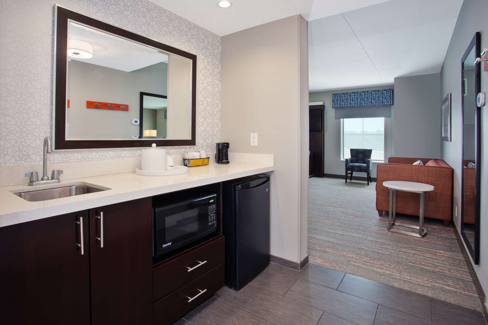 King Studio Suite | Living area | 50-inch LCD TV with cable channels, TV