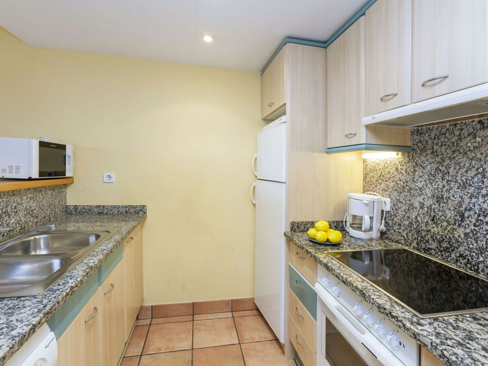 Property, Room, Countertop, Yellow, Real Estate, Kitchen, Furniture, Building, Floor, House