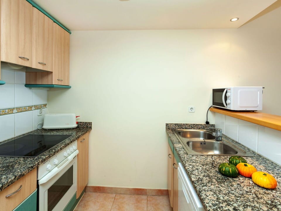 Countertop, Property, Room, Kitchen, Green, Interior Design, Building, Yellow, House, Furniture