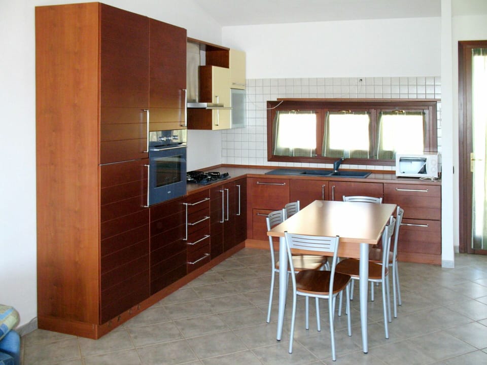 Furniture, Countertop, Room, Cabinetry, Kitchen, Property, Building, Major Appliance, Interior Design, Plywood