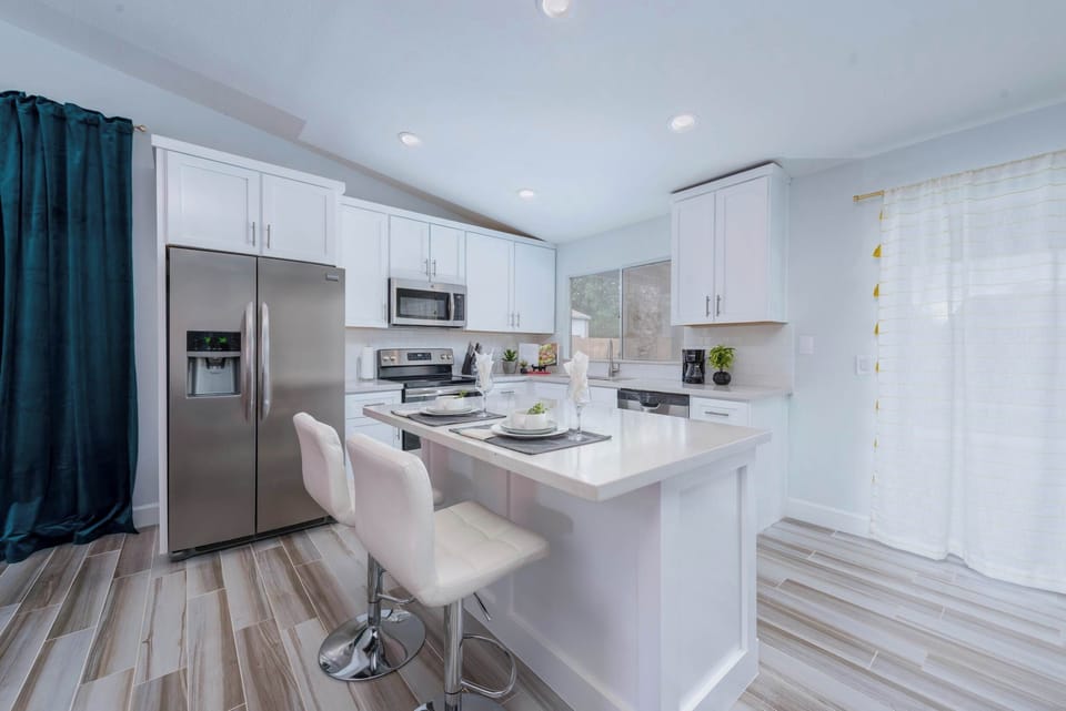 Open concept kitchen and dining room with all the basic cooking essentials.
