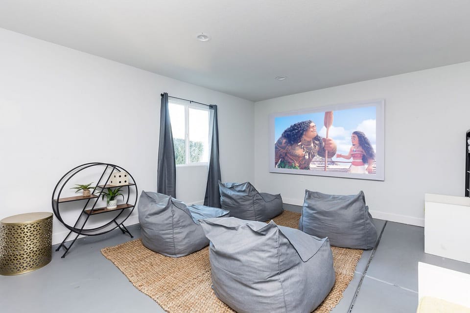 5th Bedroom: 2 Twin and 2 Double bunkbeds with projection screen and bean bag chairs